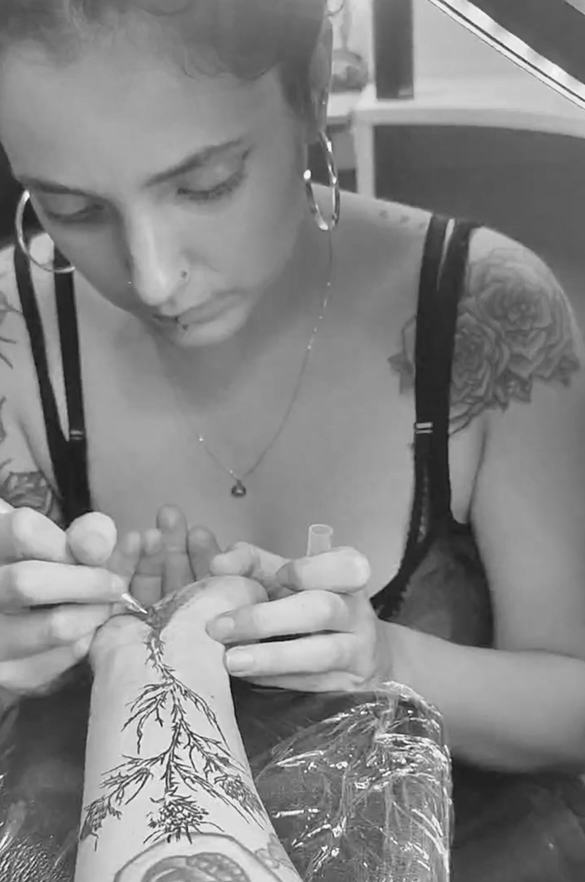 Portrait of the artist at work